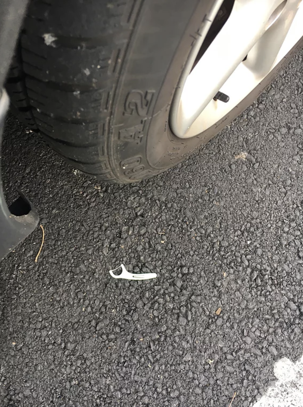 Dental floss in parking lot